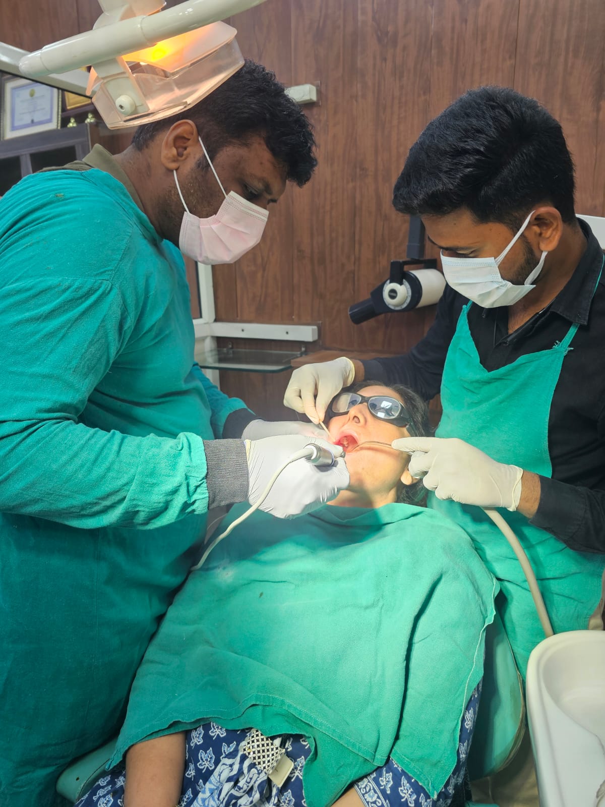 Two doctors providing treatment
