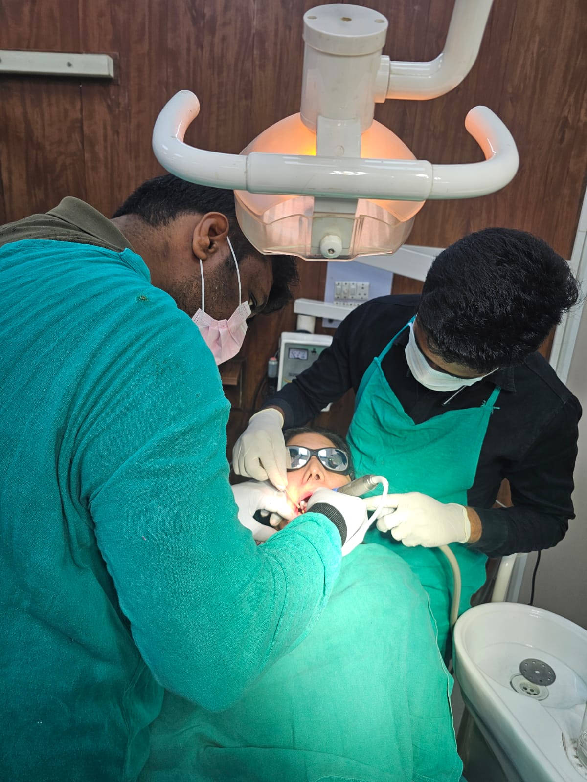 Doctors treating patient
